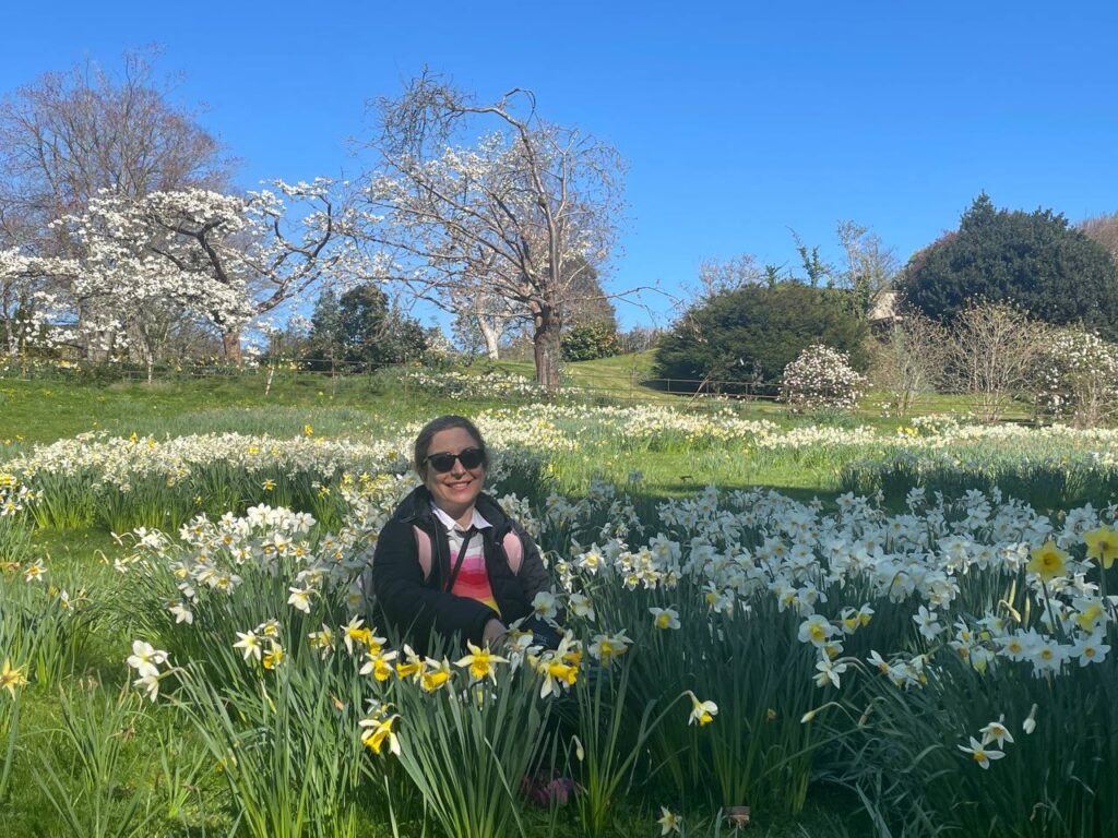 Sanaz in the middle of daffodils